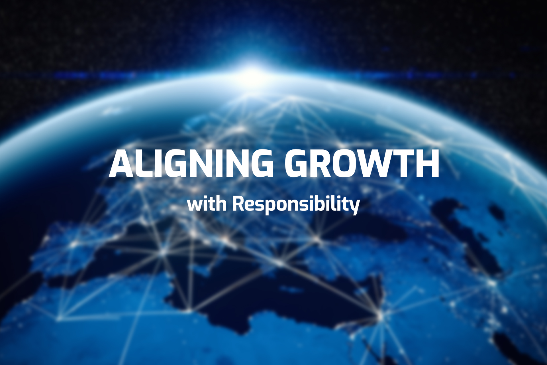 Letras blancas que dicen «Aligning growth with responsibility» sobre un globo terráqueo azul oscuro