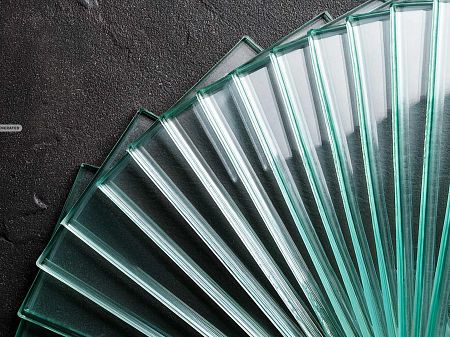 Image of glass panes against a dark stone surface