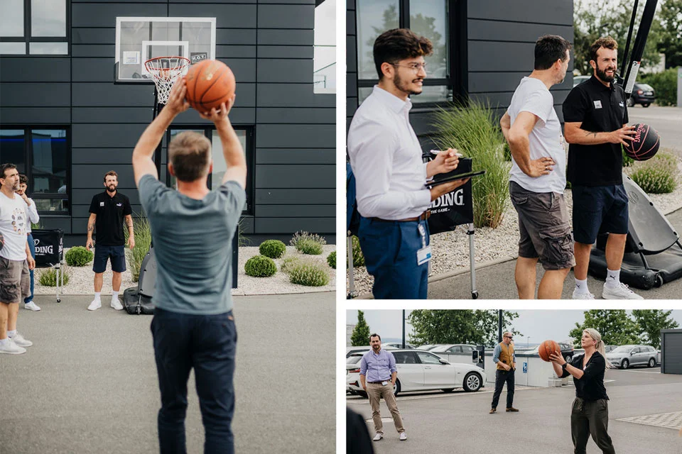 Plusieurs collaborateurs jouent au basket-ball dans une cour de l'entreprise, marquent des paniers et observent le jeu devant l'immeuble de bureaux.